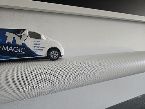 Mini TV Magic van on top of a floating soundbar