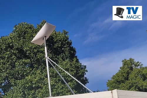 A TV Magic Starlink install on an extended mast. Logo in top right corner.