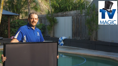 technician with a TV in a pool yard