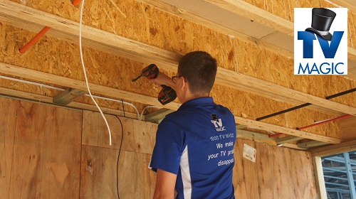 techician attending to a pre-wire fit out