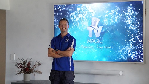 Jim with a newly wall mounted Samsung Frame TV