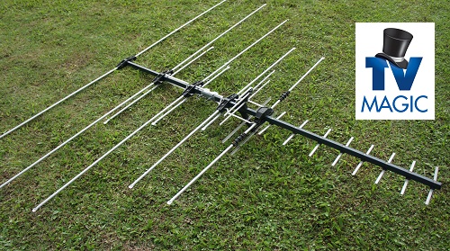 an antenna laying on grass. TV Magic logo in top right corner