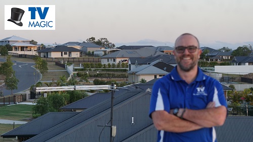 Technician with a new antenna installation. Logo in top left corner