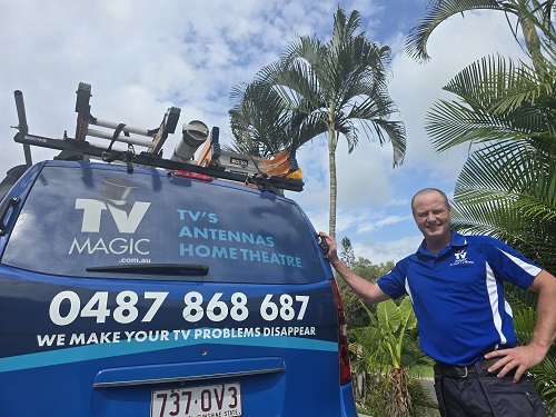 Technician Ben at the rear of his TV Magic vehicle