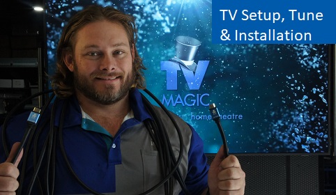 a technician with cables around his neck. Caption "TV setup, tune and Instalallation" in top right corner with TV Magic logo