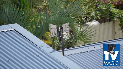 an antenna on a tin roof with a TV Magic logo in bottom right corner