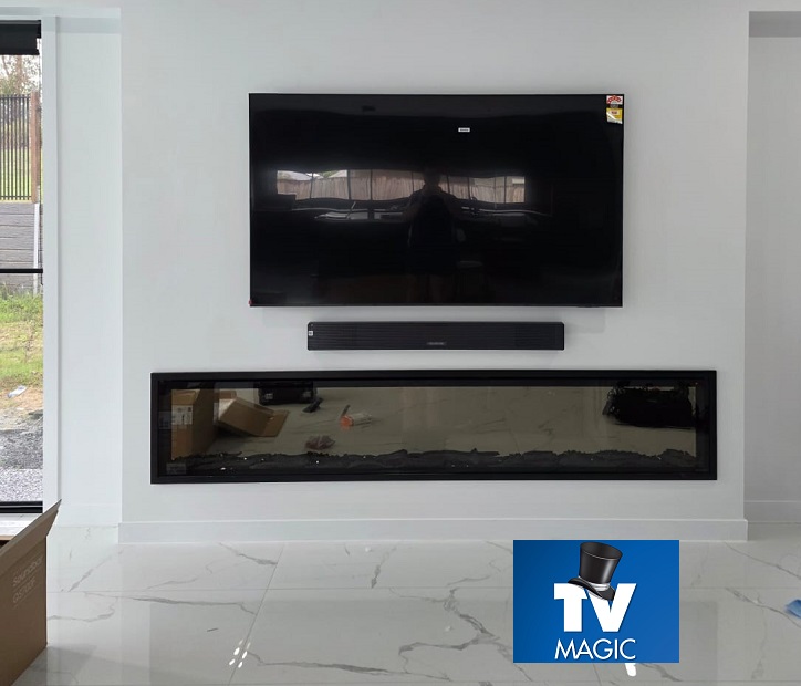 Above Fireplace with floating soundbar 2025