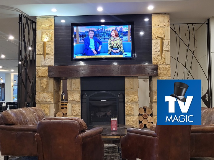 Above fireplace mounted TV commercial job 2025