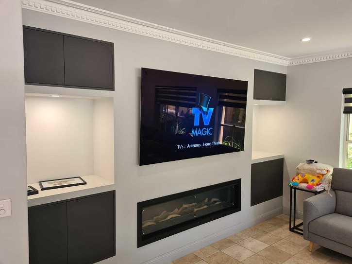 very nice TV mounted above fireplace 2025